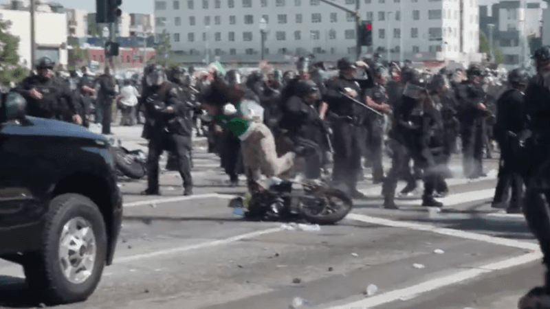 LA anti-ICE protesters arrested as police fire flash bangs, rubber bullets